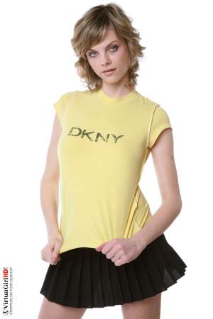 Stripper Picture of Maggie - Maggie is just 22 years old but somehow she has an allure that seems to come from a more classic 1970s or 1960s kind of sex appeal. Many of her fans are older men with more refined tastes. Maggie is like a fine red wine to be savored slowly.