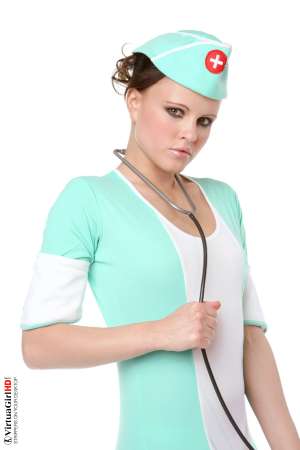 Stripper Picture of Monica Sweet - Adorable petite Monica Sweet is a performer we have had in our studio several times to put on a variety of shows because of her huge popularity with all of our members. We have to admit we were not overly-impressed with her first performance but our members said she just needed a second audition� and as usual they were right!