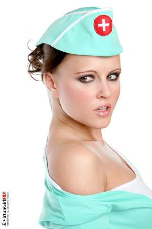 Stripper Picture of Monica Sweet - Adorable petite Monica Sweet is a performer we have had in our studio several times to put on a variety of shows because of her huge popularity with all of our members. We have to admit we were not overly-impressed with her first performance but our members said she just needed a second audition� and as usual they were right!