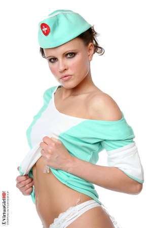 Stripper Picture of Monica Sweet - Adorable petite Monica Sweet is a performer we have had in our studio several times to put on a variety of shows because of her huge popularity with all of our members. We have to admit we were not overly-impressed with her first performance but our members said she just needed a second audition� and as usual they were right!