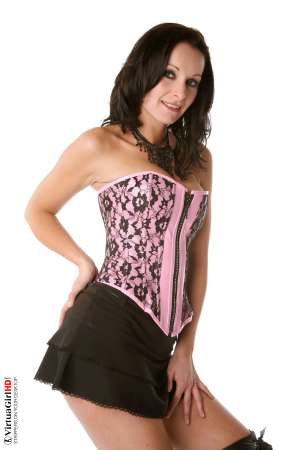 Stripper Picture of Carla Pacini - Sexy Belgian brunette Carla Pacini has the kind of face that makes her seem familiar. You might think you know her already or maybe you have seen her before somewhere else? Nope she only performs on VirtuaGirlHD exclusively and she can be your own private dancer!