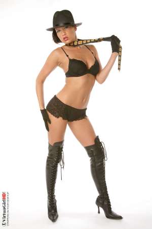 Stripper Picture of Denisa K - It may sound strange but Denisa is actually a very shy young lady. Off stage she doesn�t speak much she�s always listening and trying to learn from hearing what other people have to say. Then when it�s her turn to perform it�s like a complete transformation takes place as she steps out on the stage and becomes a charming all-out powerhouse of a performer!