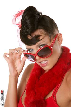 Stripper Picture of Denisa K - It may sound strange but Denisa is actually a very shy young lady. Off stage she doesn�t speak much she�s always listening and trying to learn from hearing what other people have to say. Then when it�s her turn to perform it�s like a complete transformation takes place as she steps out on the stage and becomes a charming all-out powerhouse of a performer!