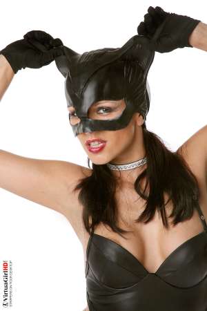 Stripper Picture of Katty - Devilish little Katty loves the attention that she gets when she steps on stage for you. She used to work for a lingerie design company and even did some of the style work herself so she knows which outfits work best for her body and she is quickly becoming one of our more popular models. Stylish sultry sexy that's Katty!