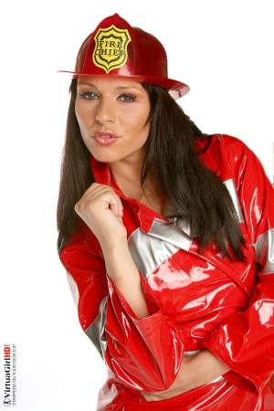 Stripper Picture of Katty - Devilish little Katty loves the attention that she gets when she steps on stage for you. She used to work for a lingerie design company and even did some of the style work herself so she knows which outfits work best for her body and she is quickly becoming one of our more popular models. Stylish sultry sexy that's Katty!