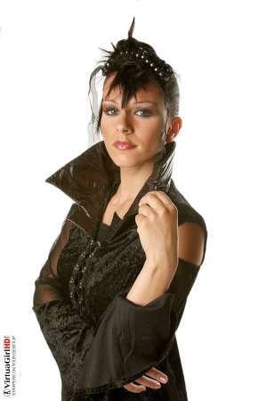 Stripper Picture of Katty - Devilish little Katty loves the attention that she gets when she steps on stage for you. She used to work for a lingerie design company and even did some of the style work herself so she knows which outfits work best for her body and she is quickly becoming one of our more popular models. Stylish sultry sexy that's Katty!