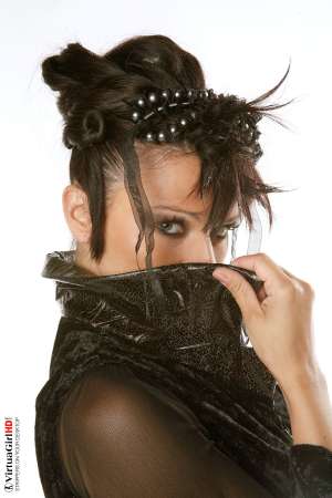 Stripper Picture of Katty - Devilish little Katty loves the attention that she gets when she steps on stage for you. She used to work for a lingerie design company and even did some of the style work herself so she knows which outfits work best for her body and she is quickly becoming one of our more popular models. Stylish sultry sexy that's Katty!