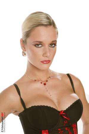 Stripper Picture of Jana H - With a dirty-dozen performances in her collection already Jana H is already well on her way to being the best known Virtua Girl of them all. She gets a lot of fans� emails and takes her time to read each of them because she wants to be able to improve with each new performance!