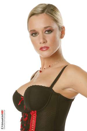 Stripper Picture of Jana H - With a dirty-dozen performances in her collection already Jana H is already well on her way to being the best known Virtua Girl of them all. She gets a lot of fans� emails and takes her time to read each of them because she wants to be able to improve with each new performance!