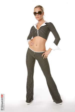 Stripper Picture of Jana H - With a dirty-dozen performances in her collection already Jana H is already well on her way to being the best known Virtua Girl of them all. She gets a lot of fans� emails and takes her time to read each of them because she wants to be able to improve with each new performance!