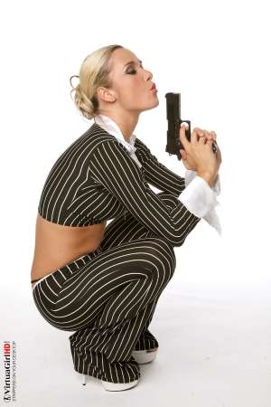 Stripper Picture of Jana H - With a dirty-dozen performances in her collection already Jana H is already well on her way to being the best known Virtua Girl of them all. She gets a lot of fans� emails and takes her time to read each of them because she wants to be able to improve with each new performance!