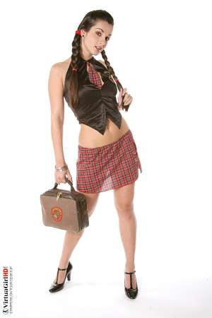 Stripper Picture of Ennie - Ennie is actually twenty-two years old and while she looks a lot younger we can tell you that her listed age is correct. She comes from a large family and told us all of her siblings look younger than they are� so enjoy this �permanent teen� performer. She�s something special!