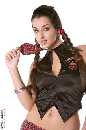 Stripper Picture of Ennie - Ennie is actually twenty-two years old and while she looks a lot younger we can tell you that her listed age is correct. She comes from a large family and told us all of her siblings look younger than they are� so enjoy this �permanent teen� performer. She�s something special!