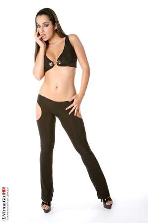 Stripper Picture of Ennie - Ennie is actually twenty-two years old and while she looks a lot younger we can tell you that her listed age is correct. She comes from a large family and told us all of her siblings look younger than they are� so enjoy this �permanent teen� performer. She�s something special!