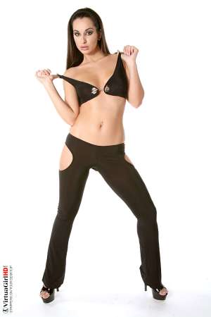 Stripper Picture of Ennie - Ennie is actually twenty-two years old and while she looks a lot younger we can tell you that her listed age is correct. She comes from a large family and told us all of her siblings look younger than they are� so enjoy this �permanent teen� performer. She�s something special!