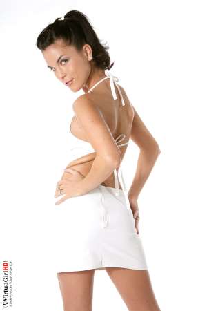 Stripper Picture of Nella - Nella came to us from the Czech Republic but her origins extend all the way to Cuba. Her ancestors left the Caribbean island in 1954 and settled in Europe. She�s a mix of the elegant �old world� and the fiery intensity of an �island girl� as well. It�s a powerful combination!