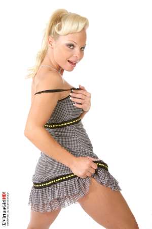 Stripper Picture of Sharka Blue - Sharka is originally from the Czech Republic but she has spent a couple years dancing �down under� in Australia and New Zealand. That�s where she got her stage name and also why you will notice a difference in style between some of her moves and those of our other girls. Her pussy play is what really sets her apart in the mind of most members!