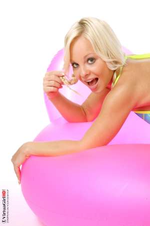 Stripper Picture of Sharka Blue - Sharka is originally from the Czech Republic but she has spent a couple years dancing �down under� in Australia and New Zealand. That�s where she got her stage name and also why you will notice a difference in style between some of her moves and those of our other girls. Her pussy play is what really sets her apart in the mind of most members!