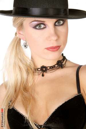 Stripper Picture of Julya - In the mood for a blonde a tight body that never quits? If you like your girl to have some stamina so she�s able to perform all night long then Julya may be the best pick of the bunch. Swedish starlets who run 5K a day and maintain their fitness like hers are quite a find!