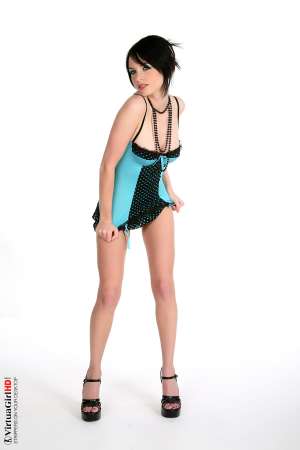 Stripper Picture of Jenna Sweet - Jenna is like a deliciously delicate dessert from Belgium. The kind that is so pretty to look at it takes you a minute before you are ready to dig-in and taste it for the first time. Long legs and lanky arms may make you think she moves awkwardly but once you see her dancing you�ll find out just how fluid her body can be. She�s oh sooooo sweet! Jenna Sweet is Jenni in the Classic cards collection.