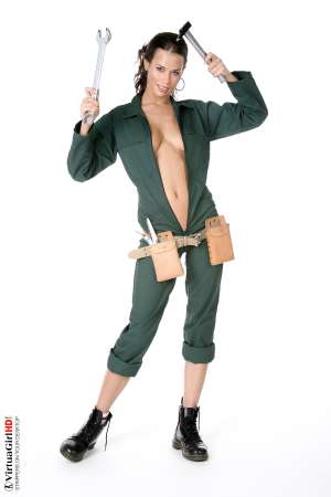 Stripper Picture of Marie - When we met Marie we could not believe what a nice sweet girl she really is and you'll see the way that comes through during her performances as well. She considered a career in nursing before choosing to become a dancer instead. With a few well placed tattoos and the most adorable shaved pussy your eyes have ever seen!