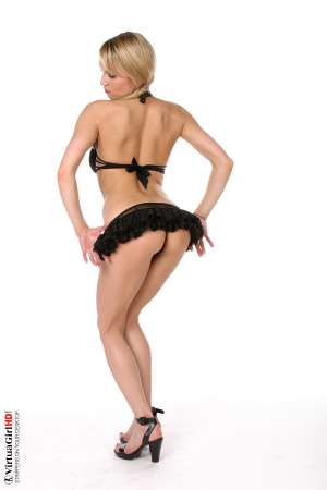 Stripper Picture of Ellen - There is something about Ellen's lips that draws your eye to them from any angle. So soft and supple when she starts to smile and makes this naughty smirk instead your heart will flutter and your mind will race away full of desires and dirty thoughts. She wears the brightest red lipstick and somehow it always looks so great on her!