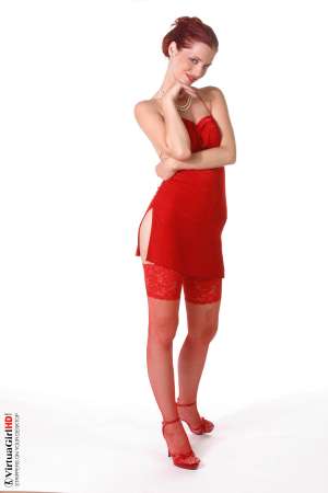 Stripper Picture of Ariel - Scarlet-haired vixen Ariel Piperfawn is not the typical VirtuaGirl in fact she is not really the typical anything! Ariel is the kind of nineteen year old free spirit who always decides to make her own path and to do things her own way. That�s one reason why we all love her. She�s got an amazingly outgoing attitude.