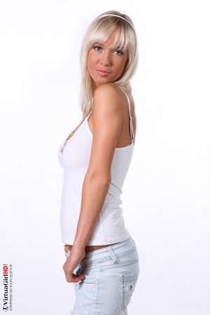 Stripper Picture of Natali Blond - Natali Blond is the perfect girl-next-door type of model. Natali doesn't just want to entertain you for a moment; she wants to be that special girl who lingers in your imagination for days after you have watched her perform. She's more than just another pretty face she's the beautiful blonde babe you can never get out of your mind completely!