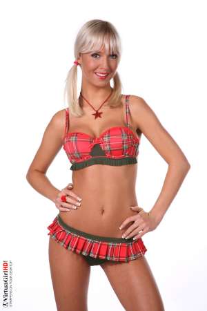 Stripper Picture of Natali Blond - Natali Blond is the perfect girl-next-door type of model. Natali doesn't just want to entertain you for a moment; she wants to be that special girl who lingers in your imagination for days after you have watched her perform. She's more than just another pretty face she's the beautiful blonde babe you can never get out of your mind completely!