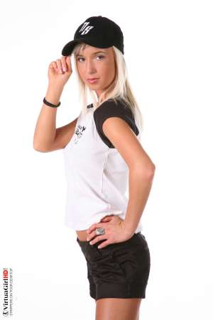 Stripper Picture of Natali Blond - Natali Blond is the perfect girl-next-door type of model. Natali doesn't just want to entertain you for a moment; she wants to be that special girl who lingers in your imagination for days after you have watched her perform. She's more than just another pretty face she's the beautiful blonde babe you can never get out of your mind completely!