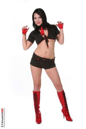 Stripper Picture of Trisha - Twenty years old Trisha is a young brunette from the city of Prague with curvy hips and a very sultry strut. When she walks into a room all eyes are on her bubble butt and the beautiful way it bounces as she moves!