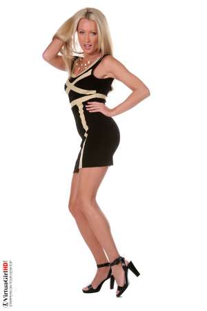 Stripper Picture of Diana Doll - You may recognize the world famous Pornstar Diana Doll in her first online strip-tease performance! This hardcore blonde starlet from Slovakia is a 32 year old blonde MILF with plenty of confidence and a body that won't ever quit. She can dance for hours!