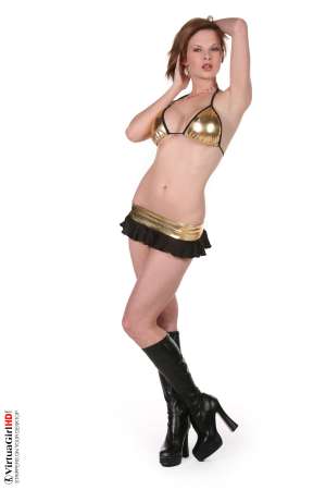 Stripper Picture of Tarra White - While most viewers focus on her big tits and beautiful body hardcore fans of Tarra White are more likely to notice she has amazing eyes. Tarra is a very successful stage dancer because she has the rare ability to make you feel she�s always looking right at you as if you are alone together sharing the moment.