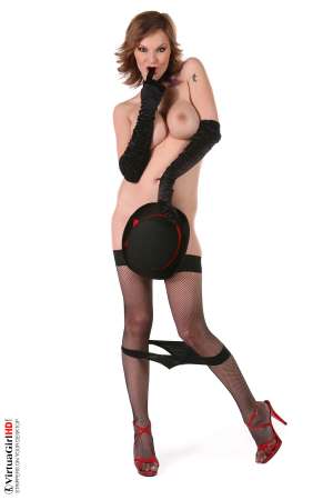 Stripper Picture of Tarra White - While most viewers focus on her big tits and beautiful body hardcore fans of Tarra White are more likely to notice she has amazing eyes. Tarra is a very successful stage dancer because she has the rare ability to make you feel she�s always looking right at you as if you are alone together sharing the moment.