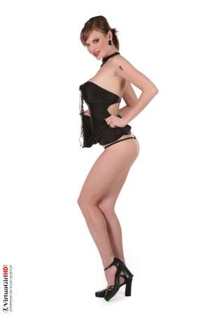 Stripper Picture of Tarra White - While most viewers focus on her big tits and beautiful body hardcore fans of Tarra White are more likely to notice she has amazing eyes. Tarra is a very successful stage dancer because she has the rare ability to make you feel she�s always looking right at you as if you are alone together sharing the moment.