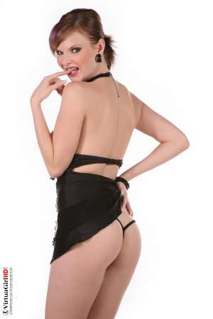 Stripper Picture of Tarra White - While most viewers focus on her big tits and beautiful body hardcore fans of Tarra White are more likely to notice she has amazing eyes. Tarra is a very successful stage dancer because she has the rare ability to make you feel she�s always looking right at you as if you are alone together sharing the moment.