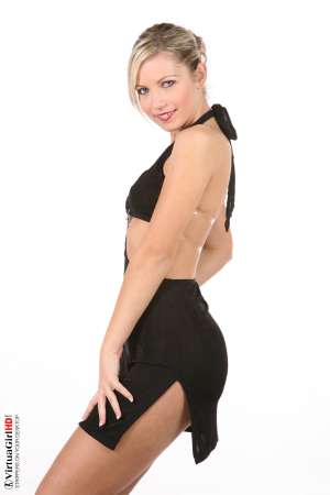 Stripper Picture of Jenni Gregg - She�s a blonde haired green eyed beauty with the all natural body that will have you licking your lips as she struts across your screen. Jenni Gregg is the perfect choice if you enjoy natural tits and high energy moves. Go ahead and give this vivacious angel some of your most intimate affection!