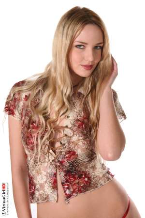 Stripper Picture of Nicca - Nicca is unlike most girls her age. Even at twenty-four she already has the grace and elegance of a more mature lady. The perfect sweetheart to bring with you to a cocktail party and an alluring party-girl for the limousine ride back to the hotel afterward � all rolled into one!