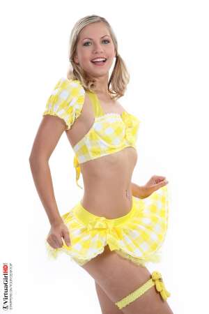 Stripper Picture of Jenni Gregg - She�s a blonde haired green eyed beauty with the all natural body that will have you licking your lips as she struts across your screen. Jenni Gregg is the perfect choice if you enjoy natural tits and high energy moves. Go ahead and give this vivacious angel some of your most intimate affection!