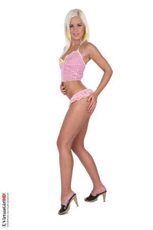 Stripper Picture of Lola - Lola is a fresh-faced party girl who is always excited to go out in the evenings with her friends. She is new to modeling and dancing which makes her seem more innocent and shy at first but once she gets comfortable in front of the cameras you can really feel her energy pulsing at you from each performance. Download Lola and watch her evolve into a premier performer!