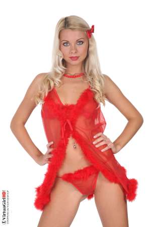 Stripper Picture of Lea Tyron - The sexiest gray eyes. Somewhere between green and blue not quite strong enough to overpower you but always noticeable the moment she walks into a room � Lea Tyron will captivate you with each move of her hand stretch of her leg or kiss from her lips! Go ahead and add Lea to your collection she will always be one of your favorites and she will also be one of ours.