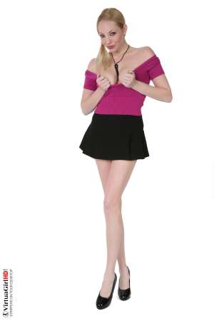 Stripper Picture of Saraliz - A tall leggy blonde with wide innocent eyes Saraliz is a Southern girl from Florida. Her carefree attitude comes from years of nude sun bathing on the beaches of her hometown in the Sunshine State. So tall and yet so flexible! Watching her move as she performs for you is like watching a summer dream unravel to reveal a beautiful finale right before you wake up.