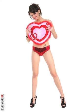 Stripper Picture of Jasmine Andreas - Jasmine Andreas is a 23 years old Edinburgh girl who has quite the personality. She loves slipping into a cute elegant or sexy outfit and letting the clothes shape the mood. She's an adorable college girl in short shorts and a crop top and a total romantic in red lingerie that leaves plenty of hints about what's underneath.