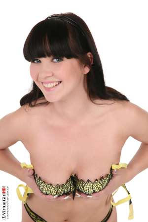 Stripper Picture of Ally Style - Eighteen year old Ally Style is a dancer ready to explode with energy and enthusiasm as she brings her athletic body onto your desktop and writhes along with the music. Her gyrating hips and strong legs are hypnotic once she gets up to full speed and her clothes start falling off! Pick your favorite outfit and see what Ally Style can do in it!