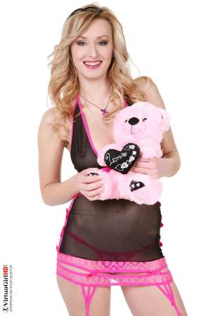 Stripper Picture of Coxy - In Prague the world of high fashion and the realm of adult entertainment often collide so a girl like Coxy can straddle the line between the two with a foot firmly planted on each side. At 22 years of age Coxy is already one of the top lingerie models in the entire Czech Republic and now she is ready to show off her body in a whole new way for you today!