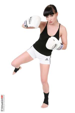 Stripper Picture of Ally Style - Eighteen year old Ally Style is a dancer ready to explode with energy and enthusiasm as she brings her athletic body onto your desktop and writhes along with the music. Her gyrating hips and strong legs are hypnotic once she gets up to full speed and her clothes start falling off! Pick your favorite outfit and see what Ally Style can do in it!