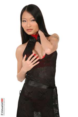 Stripper Picture of Pussykat - PussyKat is the perfect international mix of culture and heritage. Her small frame and muscular physique make her one of the most powerful 20 years old performers ever to appear in a live show. Capable of athletic moves that come from her Vietnam gymnastics background and as sultry as any French cabaret starlet. This girl has it all!