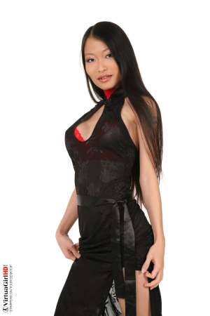 Stripper Picture of Pussykat - PussyKat is the perfect international mix of culture and heritage. Her small frame and muscular physique make her one of the most powerful 20 years old performers ever to appear in a live show. Capable of athletic moves that come from her Vietnam gymnastics background and as sultry as any French cabaret starlet. This girl has it all!