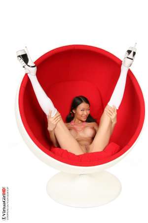 Stripper Picture of Pussykat - PussyKat is the perfect international mix of culture and heritage. Her small frame and muscular physique make her one of the most powerful 20 years old performers ever to appear in a live show. Capable of athletic moves that come from her Vietnam gymnastics background and as sultry as any French cabaret starlet. This girl has it all!