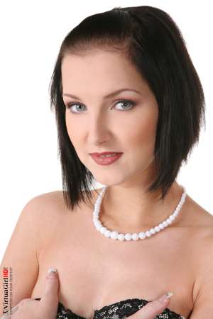 Stripper Picture of Catie - A little pixie named Catie came to us from the Czech Republic. Just 5.5 and 123 her toned body is all natural from head to toe. No implants hair dye or other tricks - she's a holistic honey who eats as a vegan. The only flesh she ever tastes is the kind her tongue touches when she pleasures all her lovers!